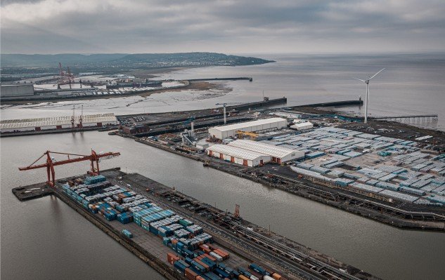 Port docks and shipping containers illustrating CBAM compliance and ESG reporting trends 2026