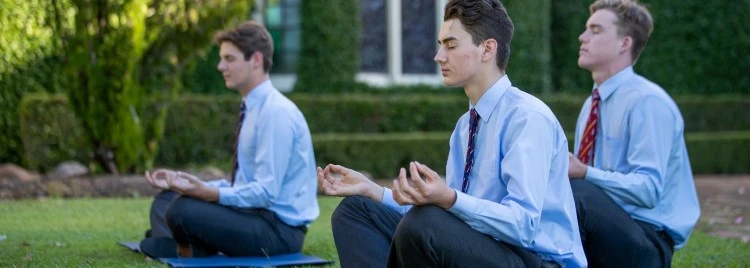 A group of businessmen in meditation