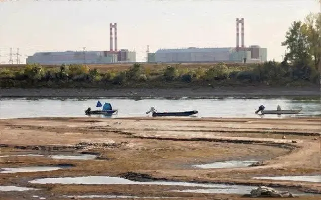 Record-low Danube water levels expose sandbanks near a riverside power plant during the 2026 European heatwave, illustrating the link between river infrastructure and urban resilience.