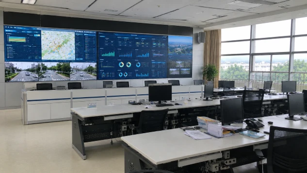 Underused smart city operations center with inactive monitoring screens and empty workstations, illustrating the challenges of digital infrastructure projects and smart city governance.